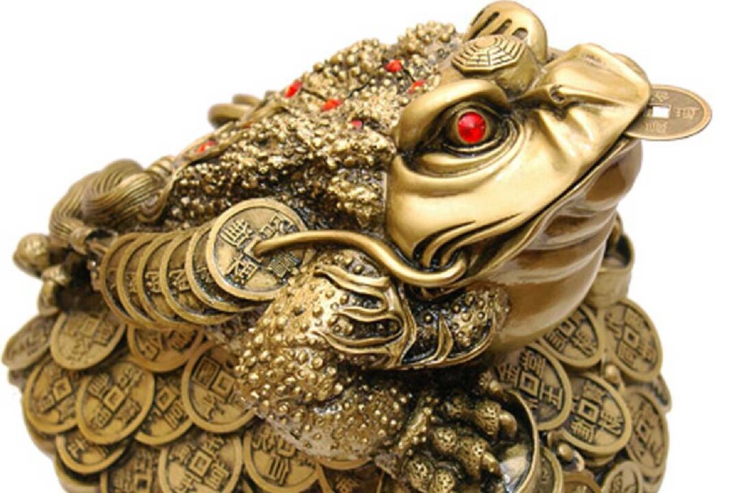 Rahakärnkonn iidse Hiina mündiga – rikkuse amulett